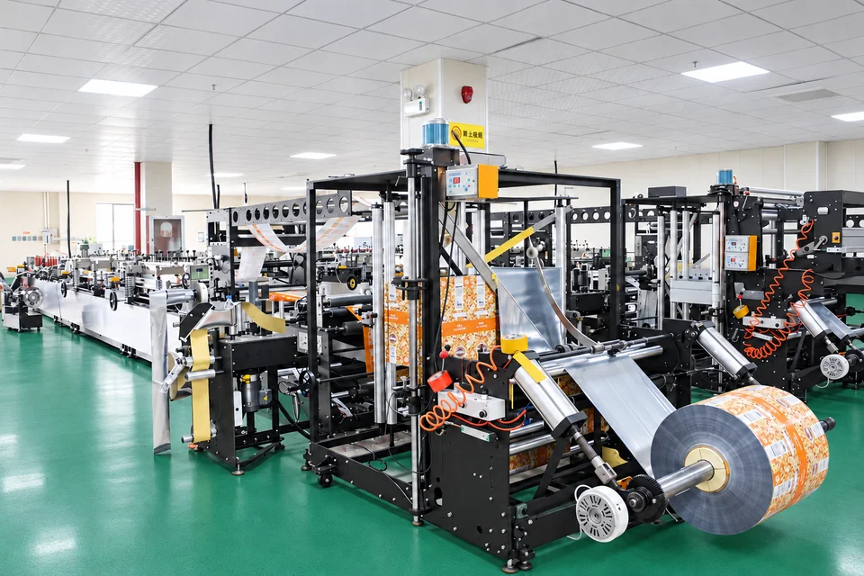 Production equipment with film rollers and printed roll materials
